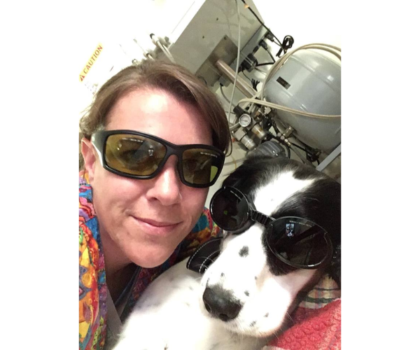 a person and dog wearing sunglasses